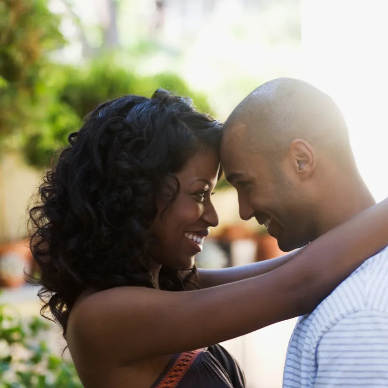 A couple in counseling discussing infidelity with their therapist.